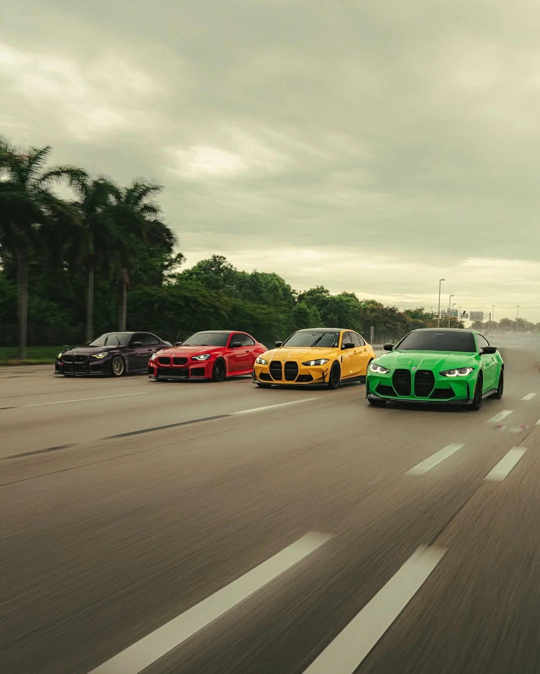 Four BMW M cars rolling down a South Florida highway